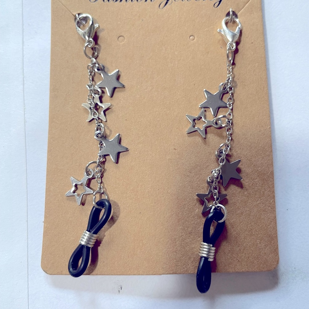 Eyeglass chain with silver closed and open stars w/ pink leather/cord strap